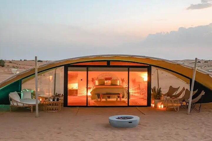 Luxuriate in your private nest with stunning desert views as the sun sets enjoying gourmet dining and starry nights filled with music and dance creating memories under the open sky.